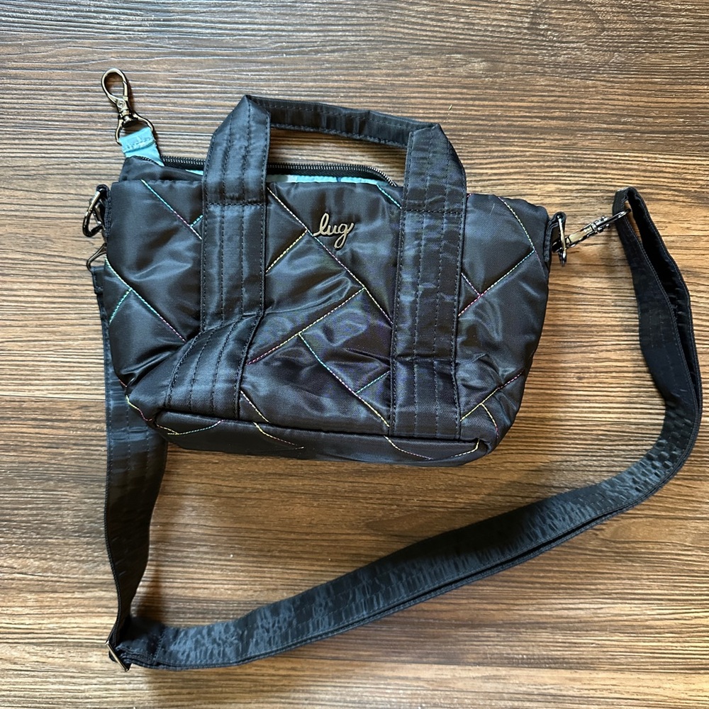 NWOT Dory Mini Lug purse in Black with rainbow stitching.